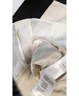 La garantie Once Again : 567231 vêtements d'occasion de marque en état irréprochable.