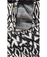 La garantie Once Again : 567624 vêtements d'occasion de marque en état irréprochable.