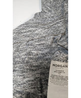 La garantie Once Again : 567978 vêtements d'occasion de marque en état irréprochable.