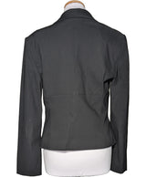 La garantie Once Again : 567999 vêtements d'occasion de marque en état irréprochable.