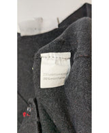 La garantie Once Again : 568325 vêtements d'occasion de marque en état irréprochable.