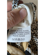 La garantie Once Again : 568435 vêtements d'occasion de marque en état irréprochable.