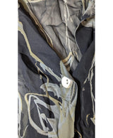 La garantie Once Again : 568440 vêtements d'occasion de marque en état irréprochable.