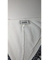 La garantie Once Again : 568988 vêtements d'occasion de marque en état irréprochable.