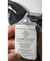 La garantie Once Again : 569009 vêtements d'occasion de marque en état irréprochable.