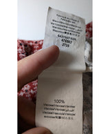 La garantie Once Again : 569011 vêtements d'occasion de marque en état irréprochable.