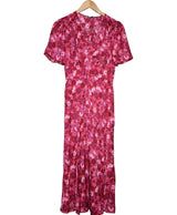 La garantie Once Again : 569198 vêtements d'occasion de marque en état irréprochable.