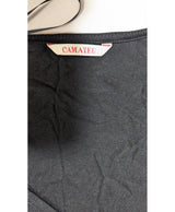 La garantie Once Again : 569233 vêtements d'occasion de marque en état irréprochable.