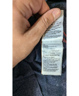 La garantie Once Again : 569305 vêtements d'occasion de marque en état irréprochable.
