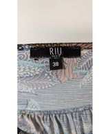 La garantie Once Again : 569720 vêtements d'occasion de marque en état irréprochable.