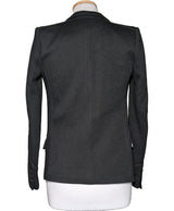 La garantie Once Again : 569991 vêtements d'occasion de marque en état irréprochable.
