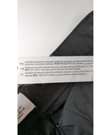 La garantie Once Again : 569995 vêtements d'occasion de marque en état irréprochable.