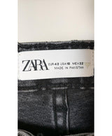La garantie Once Again : 570231 vêtements d'occasion de marque en état irréprochable.