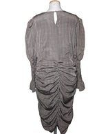 La garantie Once Again : 570333 vêtements d'occasion de marque en état irréprochable.