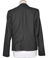 La garantie Once Again : 570474 vêtements d'occasion de marque en état irréprochable.