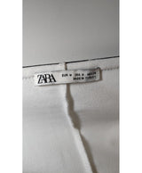 La garantie Once Again : 570625 vêtements d'occasion de marque en état irréprochable.