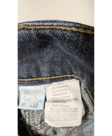 La garantie Once Again : 570834 vêtements d'occasion de marque en état irréprochable.