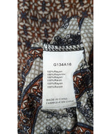 La garantie Once Again : 570978 vêtements d'occasion de marque en état irréprochable.