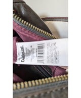La garantie Once Again : 571001 vêtements d'occasion de marque en état irréprochable.