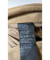 La garantie Once Again : 571300 vêtements d'occasion de marque en état irréprochable.