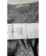 La garantie Once Again : 571339 vêtements d'occasion de marque en état irréprochable.