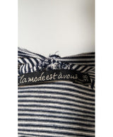 La garantie Once Again : 571506 vêtements d'occasion de marque en état irréprochable.