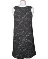 La garantie Once Again : 571531 vêtements d'occasion de marque en état irréprochable.