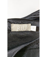 La garantie Once Again : 571670 vêtements d'occasion de marque en état irréprochable.