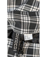 La garantie Once Again : 571743 vêtements d'occasion de marque en état irréprochable.