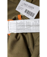 La garantie Once Again : 571801 vêtements d'occasion de marque en état irréprochable.