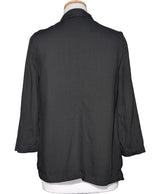La garantie Once Again : 571839 vêtements d'occasion de marque en état irréprochable.