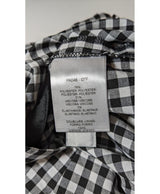 La garantie Once Again : 571921 vêtements d'occasion de marque en état irréprochable.