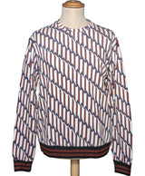 La garantie Once Again : 571934 vêtements d'occasion de marque en état irréprochable.