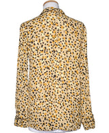 La garantie Once Again : 571973 vêtements d'occasion de marque en état irréprochable.