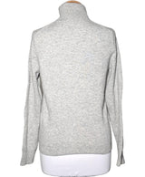 La garantie Once Again : 572278 vêtements d'occasion de marque en état irréprochable.