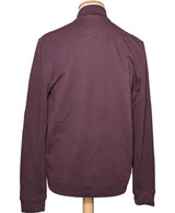La garantie Once Again : 572504 vêtements d'occasion de marque en état irréprochable.