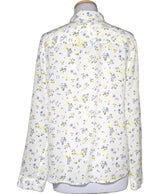 La garantie Once Again : 572521 vêtements d'occasion de marque en état irréprochable.