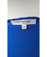 La garantie Once Again : 572542 vêtements d'occasion de marque en état irréprochable.