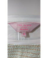 La garantie Once Again : 572604 vêtements d'occasion de marque en état irréprochable.