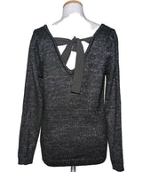 La garantie Once Again : 573176 vêtements d'occasion de marque en état irréprochable.