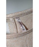 La garantie Once Again : 573192 vêtements d'occasion de marque en état irréprochable.