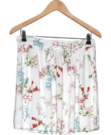 La garantie Once Again : 573236 vêtements d'occasion de marque en état irréprochable.