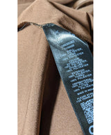 La garantie Once Again : 573316 vêtements d'occasion de marque en état irréprochable.