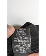 La garantie Once Again : 573494 vêtements d'occasion de marque en état irréprochable.