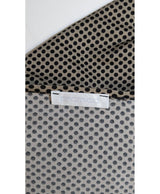 La garantie Once Again : 573497 vêtements d'occasion de marque en état irréprochable.