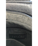 La garantie Once Again : 573561 vêtements d'occasion de marque en état irréprochable.