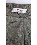 La garantie Once Again : 573568 vêtements d'occasion de marque en état irréprochable.