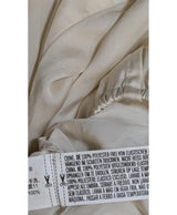 La garantie Once Again : 573603 vêtements d'occasion de marque en état irréprochable.