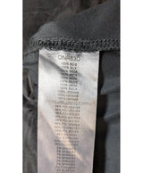 La garantie Once Again : 573696 vêtements d'occasion de marque en état irréprochable.