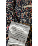 La garantie Once Again : 573772 vêtements d'occasion de marque en état irréprochable.